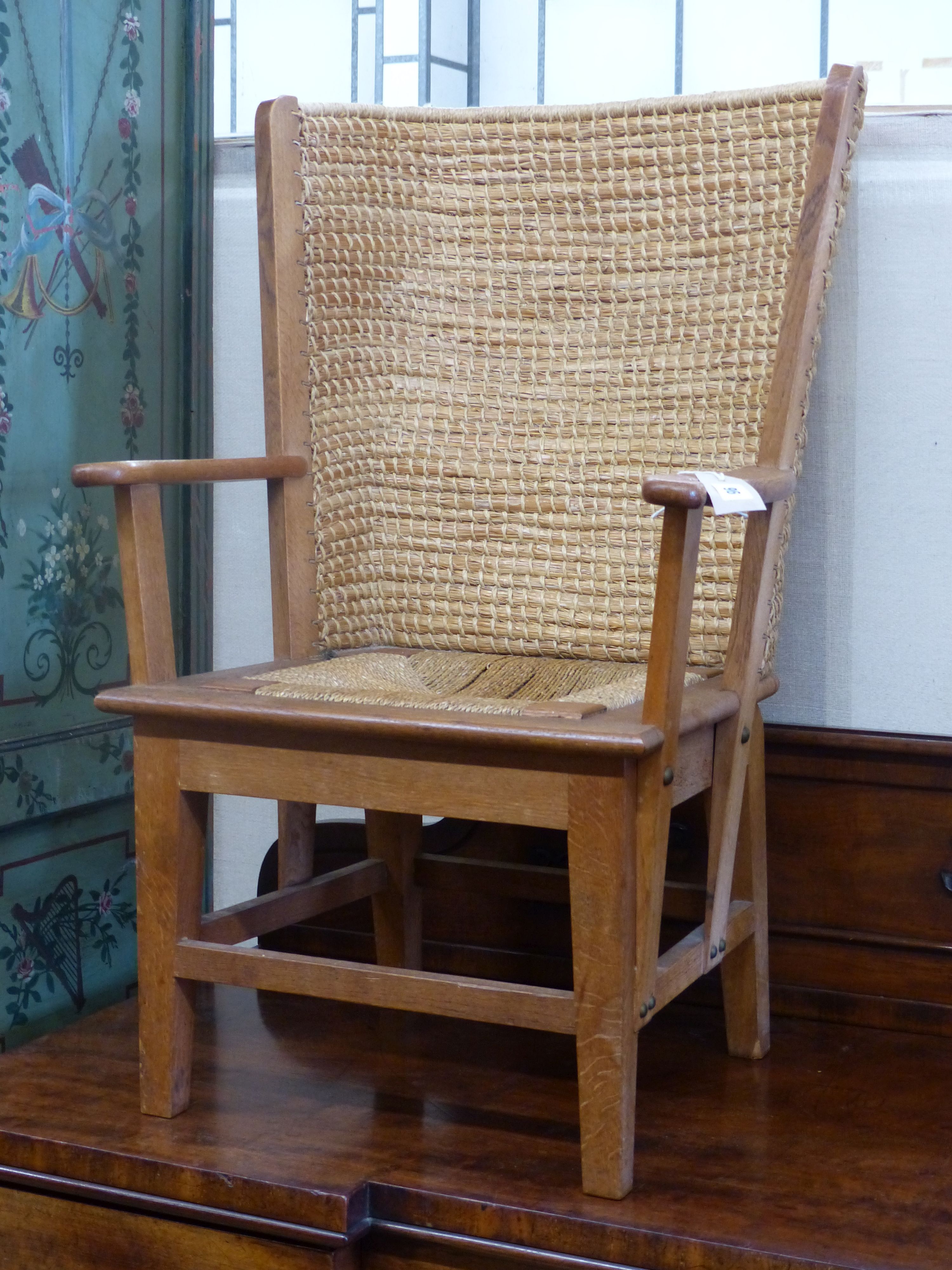 A 20th century light oak and skep work child's Orkney chair in traditional style, width 54cm, depth 56cm, height 84cm